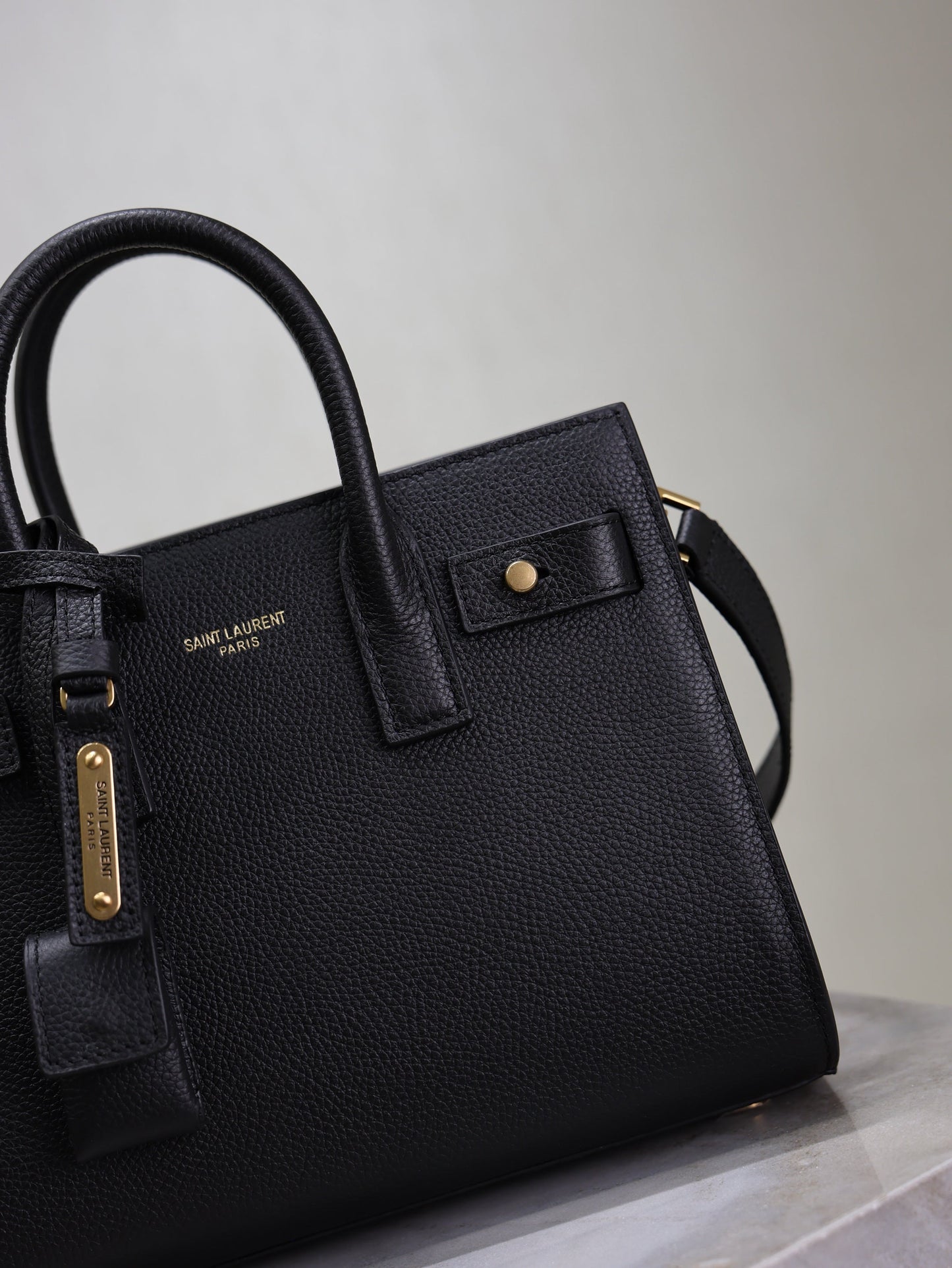 YSL 25S SAC DE JOUR 22 IN BLACK SUPPLE GRAINED CALFSKIN GOLD HARDWRE