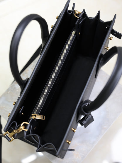YSL 25S SAC DE JOUR GM 32 IN BLACK SUPPLE GRAINED CALFSKIN GOLD HARDWARE