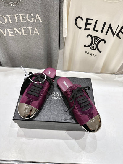 PRADA 25S MULES IN PLUM WITH METAL TOECAP