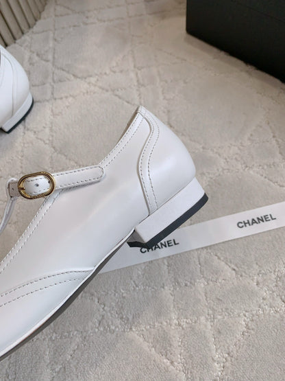 CHANEL 25S MARY JANE IN BLACK AND WHITE CALFSKIN GOLD HARDWARE