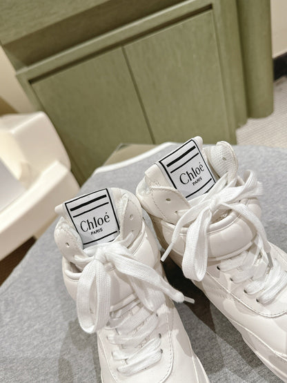 CHLOÉ 26S HIGH-TOP SNEAKERS IN WHITE CALFSKIN