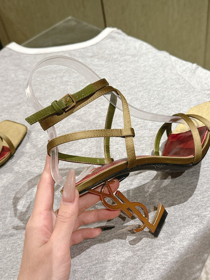 YSL 25S HIGH-HEEL SANDALS 100 MM IN MOSS GREEN SATIN WITH YSL LOGO HEEL DESIGN IN GOLD