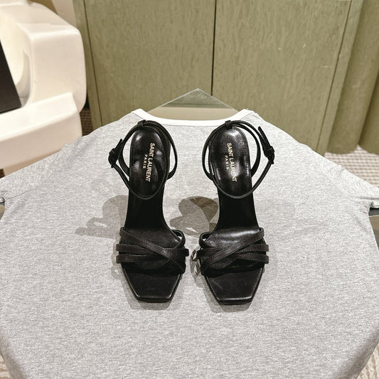YSL 25S HIGH-HEEL SANDALS 100 MM IN BLACK LAMBSKIN WITH YSL LOGO HEEL DESIGN