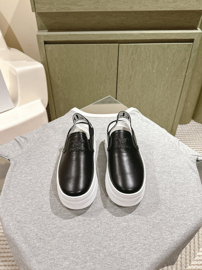 THICK-SOLED ELASTIC BACKLESS SHOES BLACK SHINY CALFSKIN