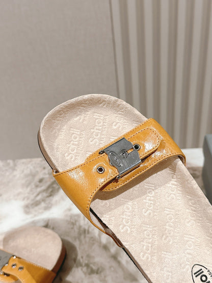 BALENCIAGA 25S SCHOLL SLIDES IN DARK ORANGE PU LEATHER WITH SILVER HARDWARE