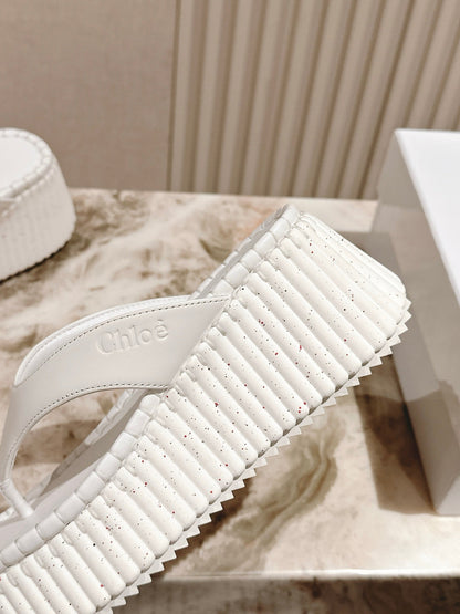 CHLOÉ 26S PLATFORM FLIP-FLOPS IN WHITE LAMBSKIN