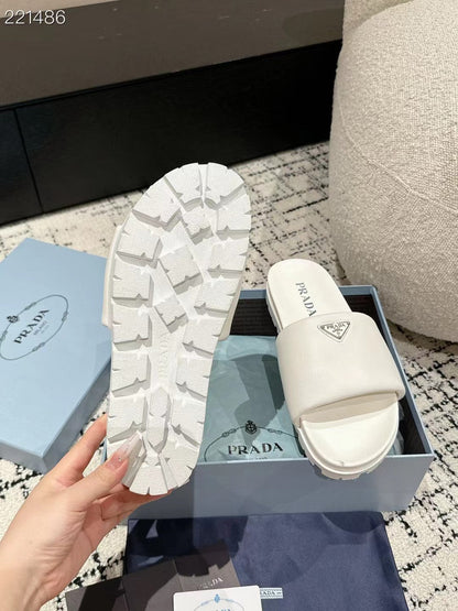PRADA 25S PADDED SLIDES IN WHITE CALFSKIN WITH LOGO