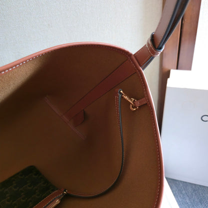 CELINE 25S SOFT SHOPPER BAG 32 IN BLACK TRIOMPHE CANVAS AND BROWN CALFSKIN