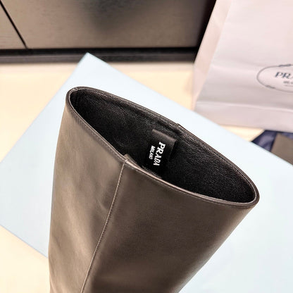 PRADA 25S SQUARE-TOE HIGH-CUT BOOTS IN BLACK CALFSKIN