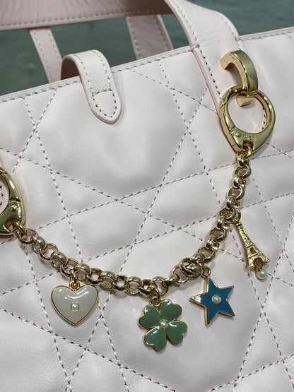 DIOR 25S TOUJOURS VERTICAL TOTE BAG 18 IN LIGHT PINK CALFSKIN WITH CHARM BRACELET STRAP