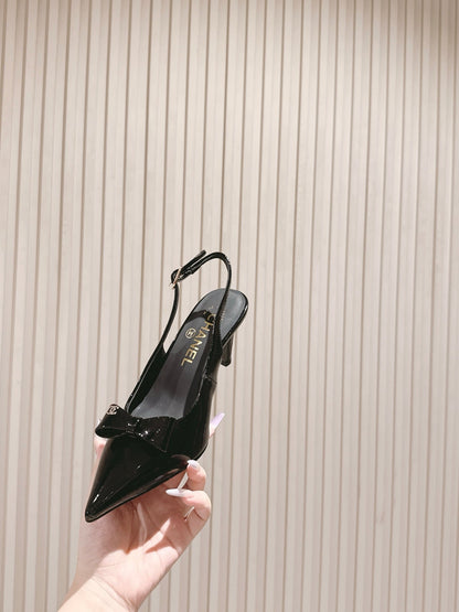 CC HIGH SLINGBACK IN BLACK LAMBSKIN WITH BOW ATTACHED