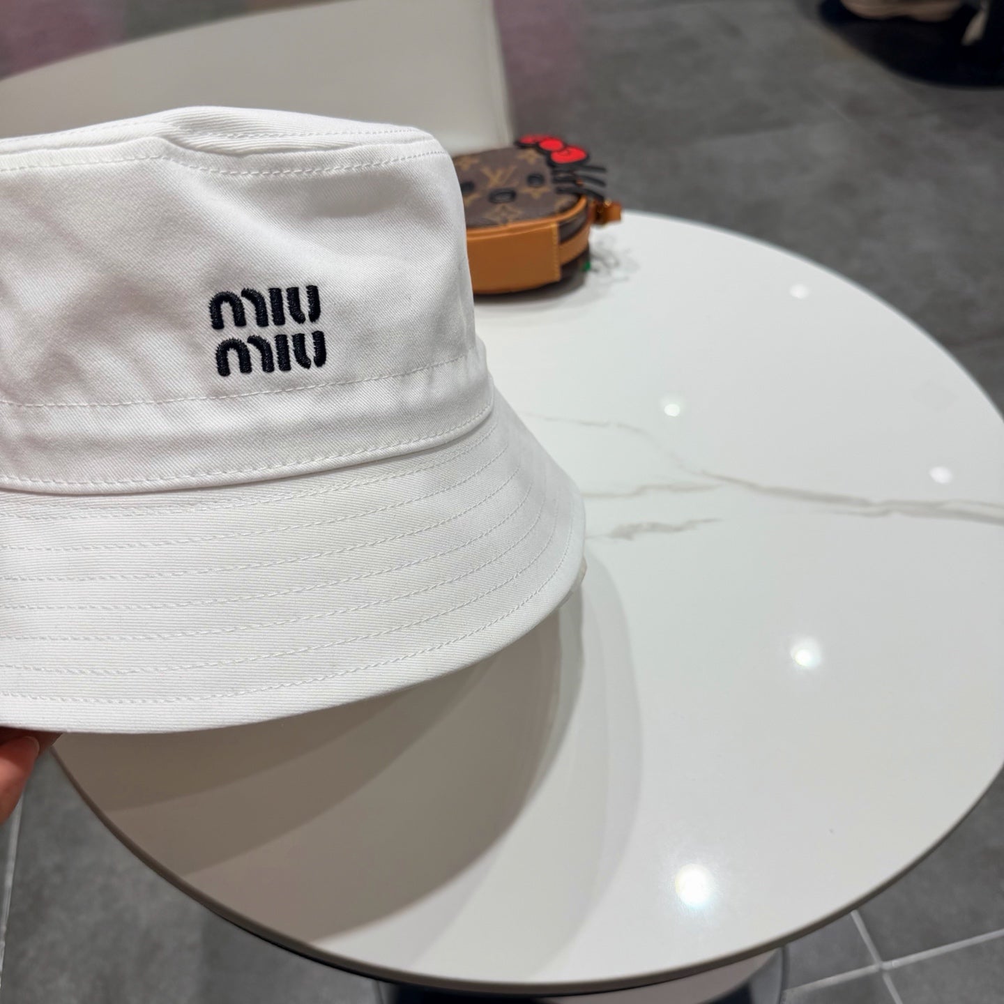 MIUMIU BUCKET HAT STYLE 84