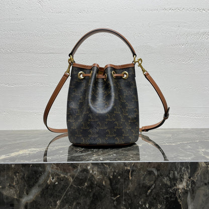 CLARA BAG 19 IN BLACK TRIOMPHE CANVAS AND BROWN CALFSKIN TRIM