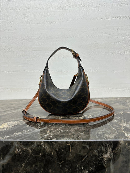 CELINE 25S TEEN LULU BAG 24 IN BLACK TRIOMPHE CANVAS AND BROWN CALFSKIN TRIM