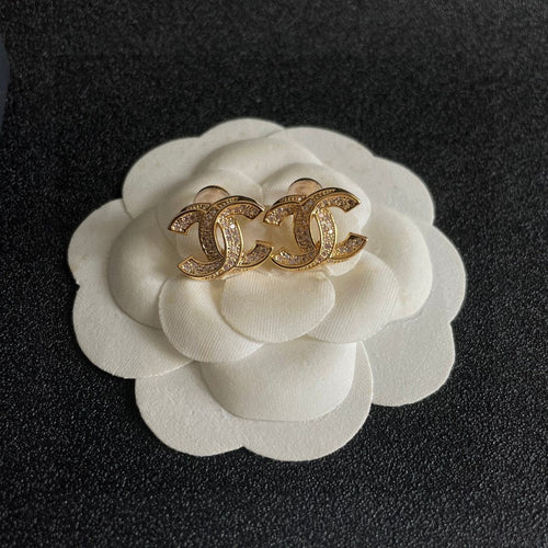 DOUBLE C STUD EARRINGS IN GOLD METAL FULLY DIAMOND