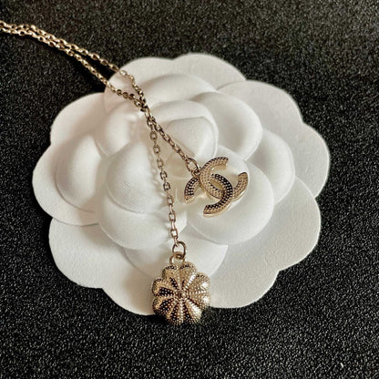 CHANEL 26S DOUBLE C LOGO PEARL FLOWER DROP NECKLACE IN GOLD METAL 629173