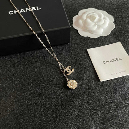 CHANEL 26S DOUBLE C LOGO PEARL FLOWER DROP NECKLACE IN GOLD METAL 629173