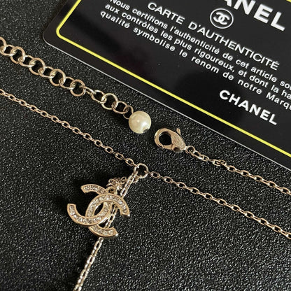 CHANEL 26S DOUBLE C LOGO PEARL FLOWER DROP NECKLACE IN GOLD METAL 629173