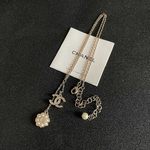 CHANEL 26S DOUBLE C LOGO PEARL FLOWER DROP NECKLACE IN GOLD METAL 629173