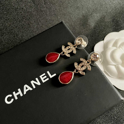CHANEL 26S DOUBLE C LOGO CRYSTAL & RED TEARDROP DANGLE EARRINGS IN GOLD METAL 629181