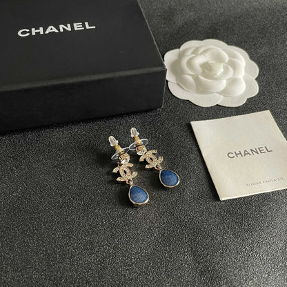 CHANEL 26S DOUBLE C CRYSTAL LOGO BLUE TEXTURED TEARDROP DANGLE EARRINGS IN GOLD METAL 629183