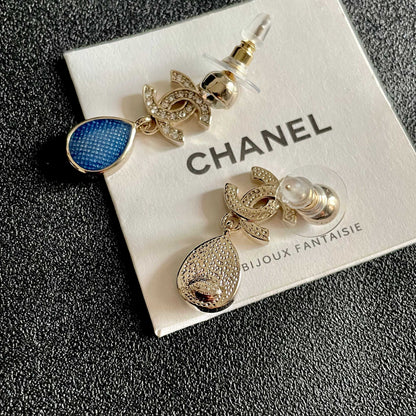 CHANEL 26S DOUBLE C CRYSTAL LOGO BLUE TEXTURED TEARDROP DANGLE EARRINGS IN GOLD METAL 629183