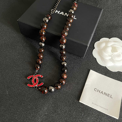 CHANEL 26S DOUBLE C LOGO RED CRYSTAL BEADED NECKLACE IN BLACK METAL 629968