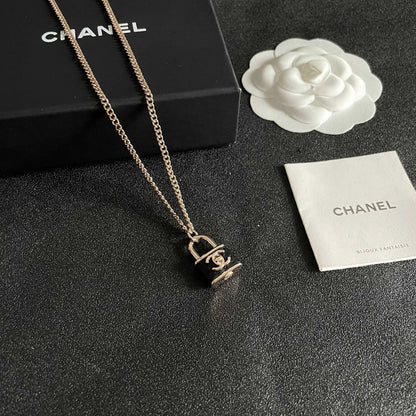 CHANEL 26S DOUBLE C LOGO PADLOCK CHAIN NECKLACE IN GOLD & BLACK METAL 629974