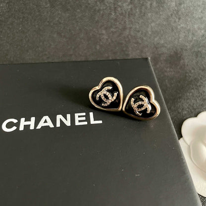 CHANEL 26S DOUBLE C LOGO BLACK HEART ENAMEL STUD EARRINGS IN GOLD METAL 629985