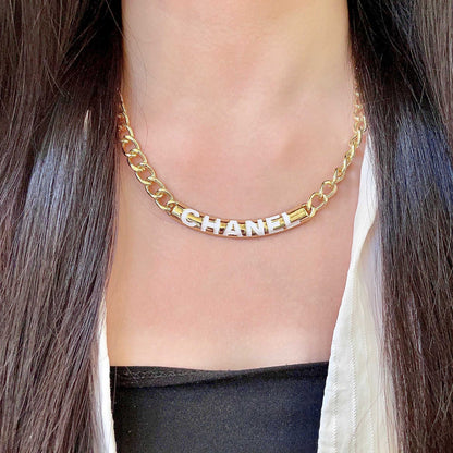 CHANEL 26S CHANEL LETTER LOGO CHAIN NECKLACE IN GOLD METAL WITH CC CHARM 630063