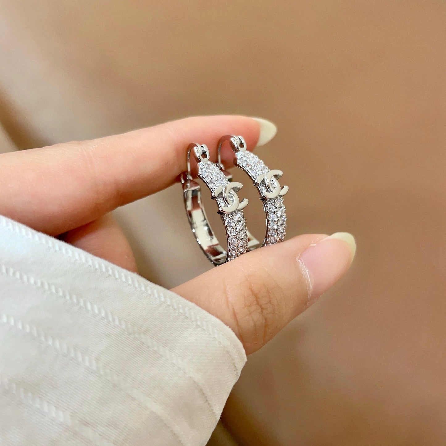 CHANEL 26S DOUBLE C LOGO FULL PAVE CRYSTAL HOOP EARRINGS IN SILVER METAL 630069