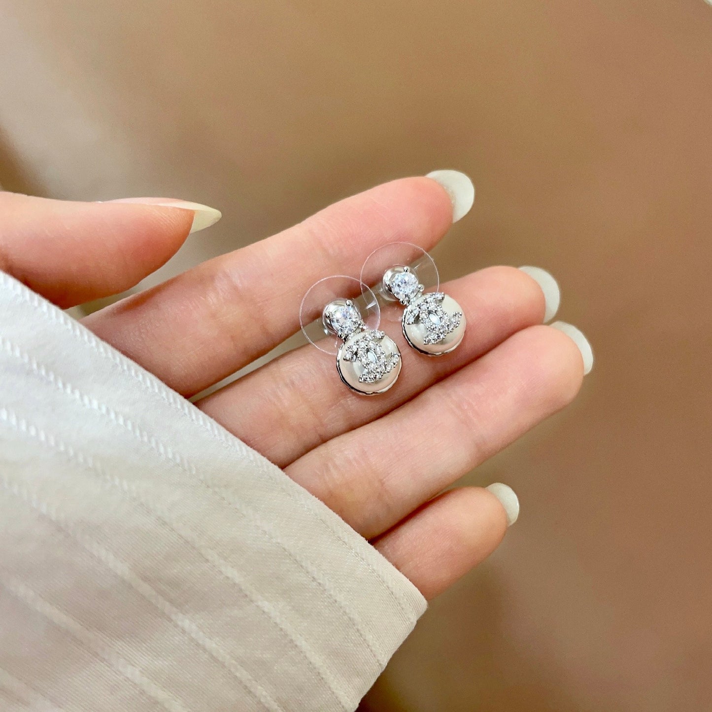 CHANEL 26S DOUBLE C ICON CRYSTAL STUD EARRINGS WITH PAVE LOGO DISC IN SILVER METAL 630076