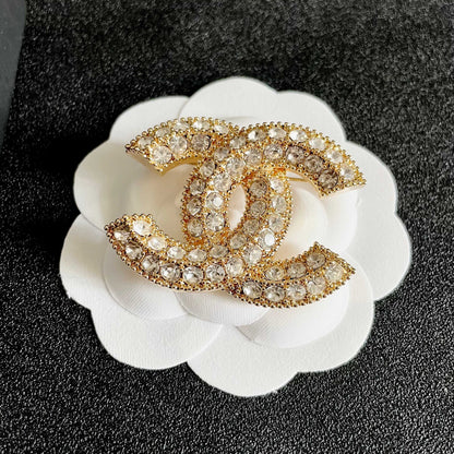 CHANEL 26S DOUBLE C LOGO FULL PAVE CRYSTAL BROOCH IN GOLD METAL 630079