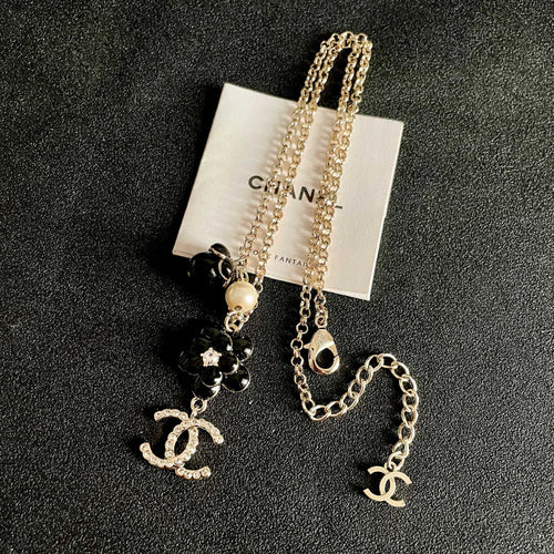 CHANEL 26S DOUBLE C LOGO BLACK FLOWER & PEARL CHARM PENDANT NECKLACE WITH CRYSTAL DETAIL IN GOLD METAL 631012