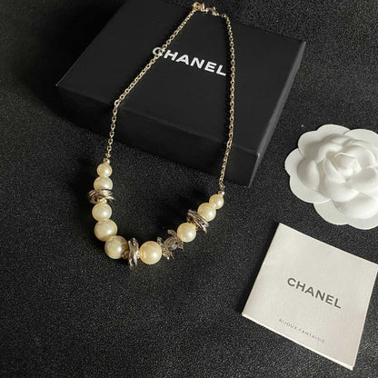 CHANEL 26S DOUBLE C LOGO PEARL BEADED BRACELET WITH CRYSTAL DETAIL IN GOLD METAL 631014