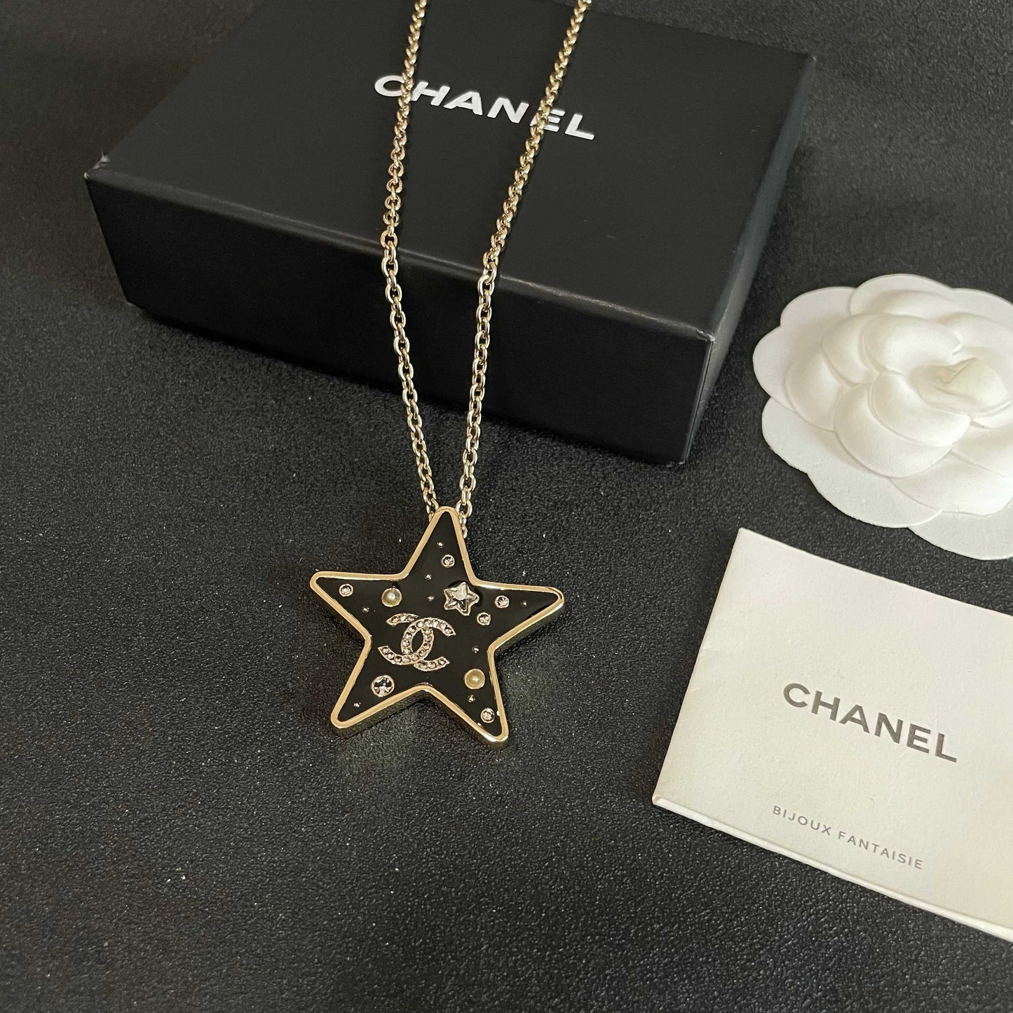CHANEL 26S DOUBLE C LOGO BLACK ENAMEL STAR PENDANT NECKLACE WITH CRYSTAL DETAIL IN GOLD METAL 631015