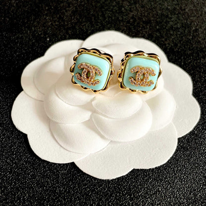 CHANEL 26S DOUBLE C LOGO MINT ENAMEL SQUARE STUD EARRINGS WITH CRYSTAL DETAIL IN GOLD METAL 631028