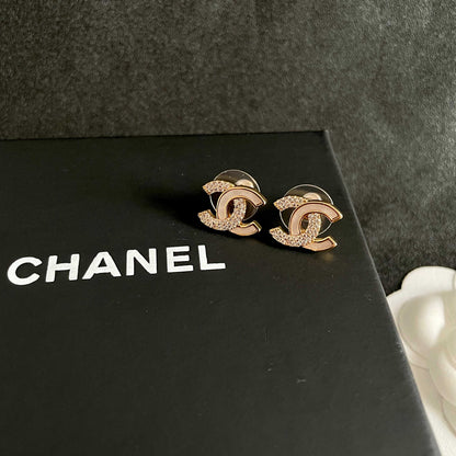 CHANEL 26S DOUBLE C LOGO IVORY ENAMEL & CRYSTAL ROUND STUD EARRINGS IN GOLD METAL 631029