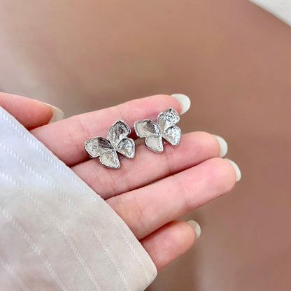 CHANEL 26S FOUR PETAL FLOWER STUD EARRINGS IN SILVER METAL 631032