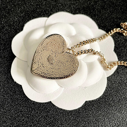 CHANEL 26S DOUBLE C LOGO HEART CHARM NECKLACE WITH NO.5 & FLORAL DETAIL IN GOLD METAL 630796
