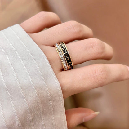 CD 26S CRYSTAL BAND LOGO RING IN GOLD TONE METAL 630811