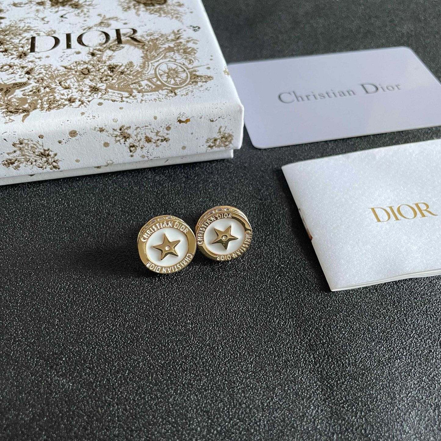 CD 26S STAR MEDALLION LOGO STUD EARRINGS IN WHITE ENAMEL & GOLD TONE METAL 631812