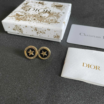 CD 26S STAR MEDALLION LOGO STUD EARRINGS IN BLACK ENAMEL & GOLD TONE METAL 631813