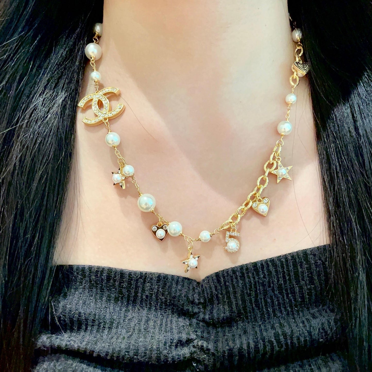 CHANEL 26S DOUBLE C LOGO PEARL CHARM NECKLACE WITH STAR AND HEART DETAILS IN GOLD METAL 631895