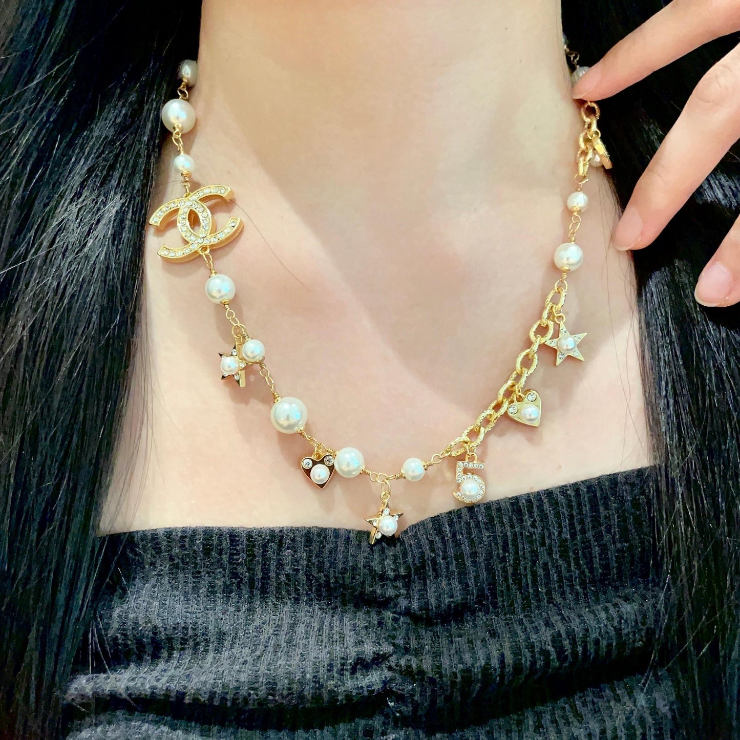 CHANEL 26S DOUBLE C LOGO PEARL CHARM NECKLACE WITH STAR AND HEART DETAILS IN GOLD METAL 631895