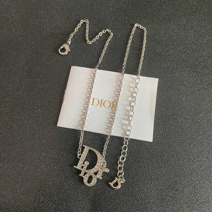 CD 26S CRYSTAL DIOR LOGO PENDANT NECKLACE IN SILVER METAL 631900