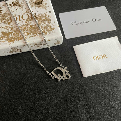 CD 26S CRYSTAL DIOR LOGO PENDANT NECKLACE IN SILVER METAL 631900