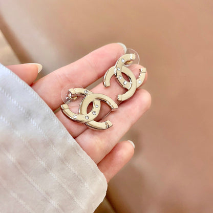 CHANEL 26S DOUBLE C LOGO CRYSTAL STUD EARRINGS IN GOLD METAL 631903