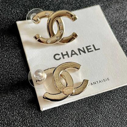 CHANEL 26S DOUBLE C LOGO CRYSTAL STUD EARRINGS IN GOLD METAL 631903
