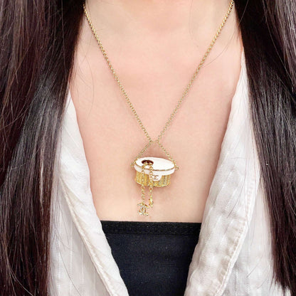 CHANEL 26S DOUBLE C LOGO MINI VANITY BAG PENDANT NECKLACE WITH STAR CHARM IN GOLD METAL 633291
